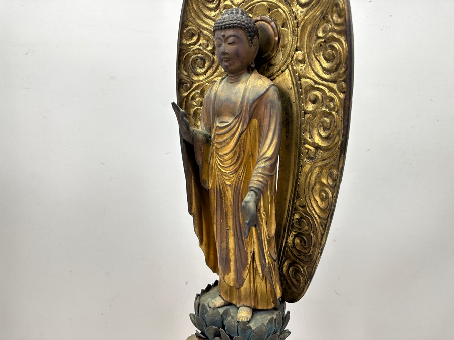 Antique Japanese Edo Period (1603-1868) Carved Gilt Wooden Sculpture Of Amida Buddha Standing On A Lotus Base With Halo Mandorla Behind The Figure 25.5'H Estimate $3,000-$6,000 [Photo 13]