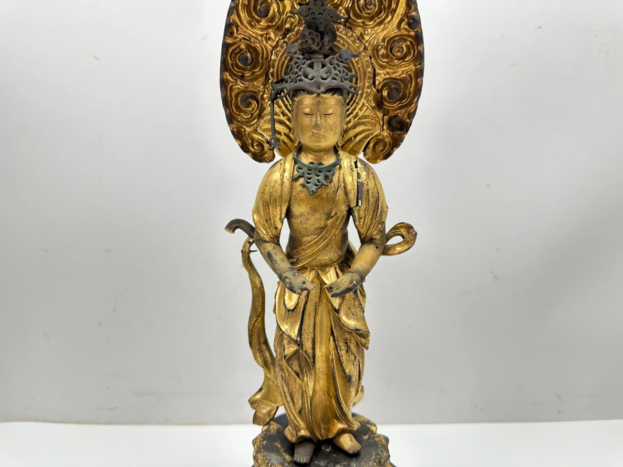 Antique Japanese Edo Period (1603-1868) Carved Gilt Wooden Sculpture Of Guanyin Buddha Standing On A Lotus Base With Halo Mandorla Behind The Figure (Some Damage To Multiple Areas Including Hands) 15.5'H Estimate $2,000-$4,000 [Photo 4]