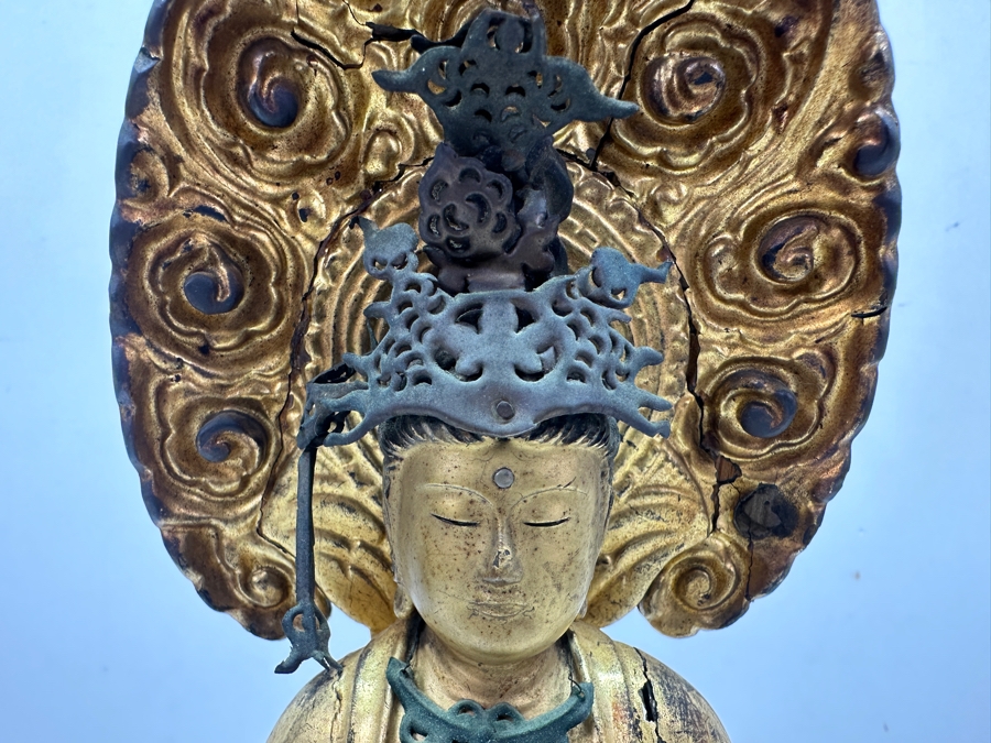 Antique Japanese Edo Period (1603-1868) Carved Gilt Wooden Sculpture Of Guanyin Buddha Standing On A Lotus Base With Halo Mandorla Behind The Figure (Some Damage To Multiple Areas Including Hands) 15.5'H Estimate $2,000-$4,000 [Photo 5]