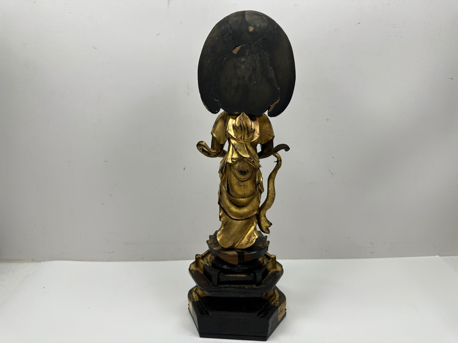 Antique Japanese Edo Period (1603-1868) Carved Gilt Wooden Sculpture Of Guanyin Buddha Standing On A Lotus Base With Halo Mandorla Behind The Figure (Some Damage To Multiple Areas Including Hands) 15.5'H Estimate $2,000-$4,000 [Photo 12]