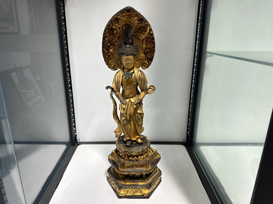 Antique Japanese Edo Period (1603-1868) Carved Gilt Wooden Sculpture Of Guanyin Buddha Standing On A Lotus Base With Halo Mandorla Behind The Figure (Some Damage To Multiple Areas Including Hands) 15.5'H Estimate $2,000-$4,000 [Photo 3]