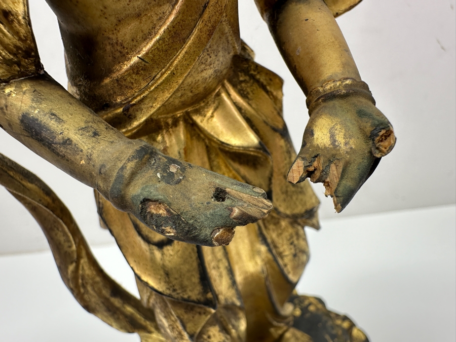 Antique Japanese Edo Period (1603-1868) Carved Gilt Wooden Sculpture Of Guanyin Buddha Standing On A Lotus Base With Halo Mandorla Behind The Figure (Some Damage To Multiple Areas Including Hands) 15.5'H Estimate $2,000-$4,000 [Photo 10]