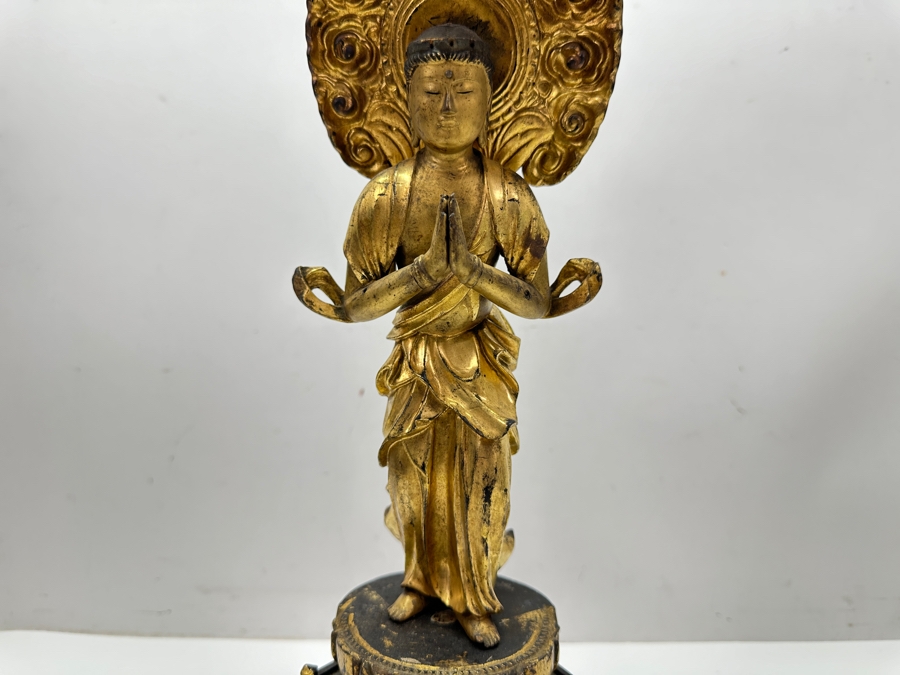 Antique Japanese Edo Period (1603-1868) Carved Gilt Wooden Buddha Sculpture Standing On A Lotus Base With Halo Mandorla Behind The Figure 15.25'H Estimate $2,000-$4,000 [Photo 15]