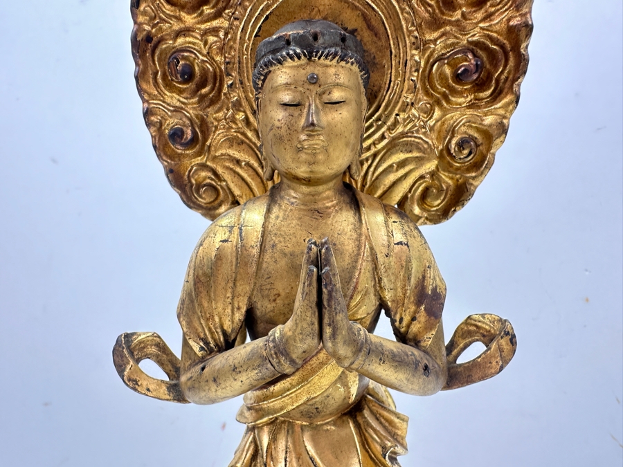 Antique Japanese Edo Period (1603-1868) Carved Gilt Wooden Buddha Sculpture Standing On A Lotus Base With Halo Mandorla Behind The Figure 15.25'H Estimate $2,000-$4,000 [Photo 14]