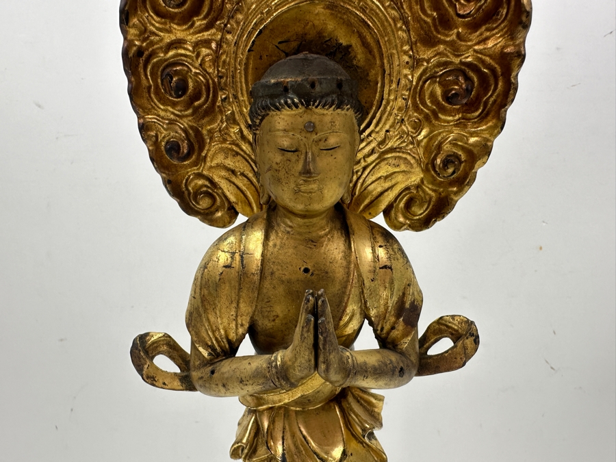 Antique Japanese Edo Period (1603-1868) Carved Gilt Wooden Buddha Sculpture Standing On A Lotus Base With Halo Mandorla Behind The Figure 15.25'H Estimate $2,000-$4,000 [Photo 7]