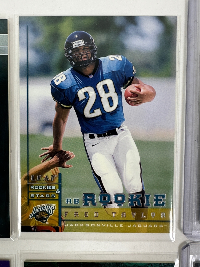 (8) Rookie Football Cards: Edgerrin James 1999 Fleer Mystique Rookie Card, (2) Fred Taylor Cards, Marshall Faulk 1994 Playoff 'Draft Picks' Rookie Card, Freddie Mitchell 2001 Fleer 'Gems' Rookie Card, Josh Heupel 2001 Topps Chrome Rookie Card [Photo 3]