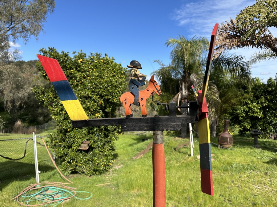 Vintage Handmade Wooden Whirligig With Man Riding Donkey 24'W x 50.5'H [Photo 2]