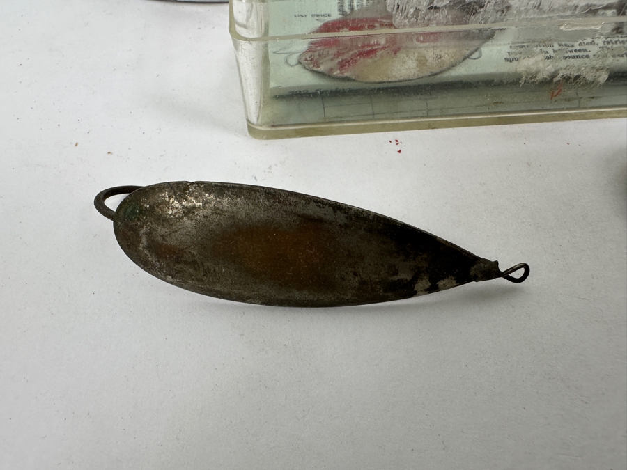 Collection Of Vintage Fishing Lures Including A Hellbender 'Hellraiser' Topwater Lure In Original Box, Johnson Silver Minnow Spoon, And Various Other Spinners And Spoons From The Mid-20th Century. 
 [Photo 14]