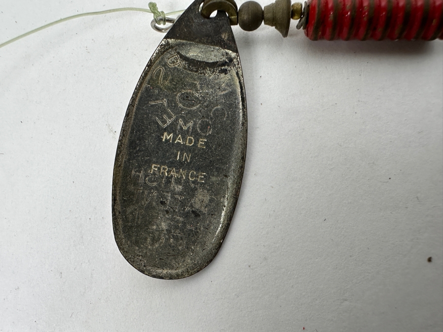 Collection Of Vintage Fishing Lures Including A Hellbender 'Hellraiser' Topwater Lure In Original Box, Johnson Silver Minnow Spoon, And Various Other Spinners And Spoons From The Mid-20th Century. 
 [Photo 4]