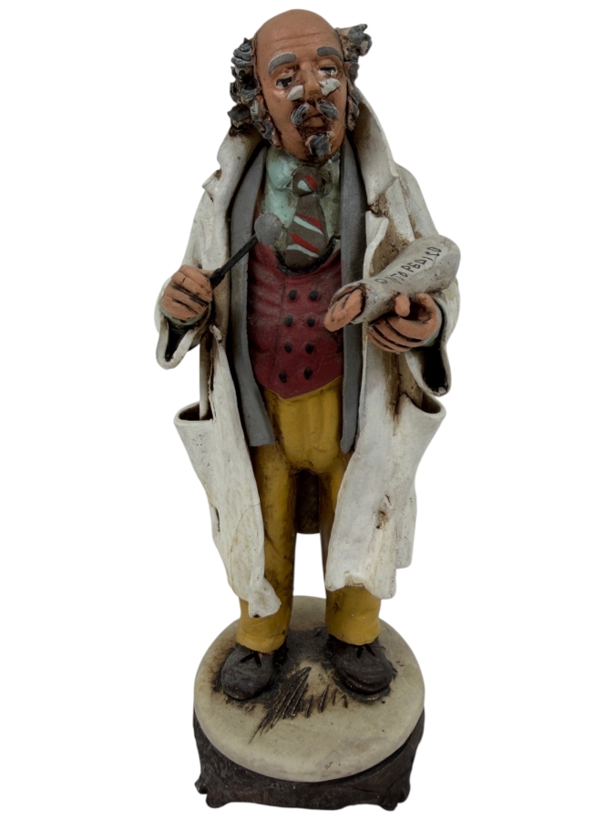 Hand Painted Pottery Sculpture Of An Orthopedic Doctor Figurine Holding Cast And Instrument Wearing Lab Coat And Striped Tie With Ortopedico Label 8.5'H