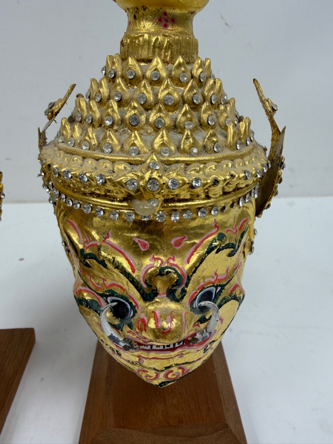 Pair Of Ornate Small Traditional Thai Khon Masks Featuring Jeweled Crowns And Fangs Mounted On Wooden Display Stands 10'H [Photo 2]