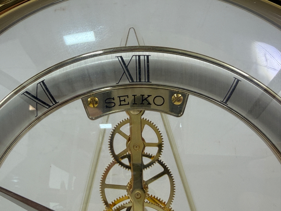 Seiko Quartz Gold Tone Round Skeleton Desk Mantel Clock With Exposed Gears And Roman Numerals Model QAW113G Made In Japan 8.5'W X 8.5'H [Photo 2]