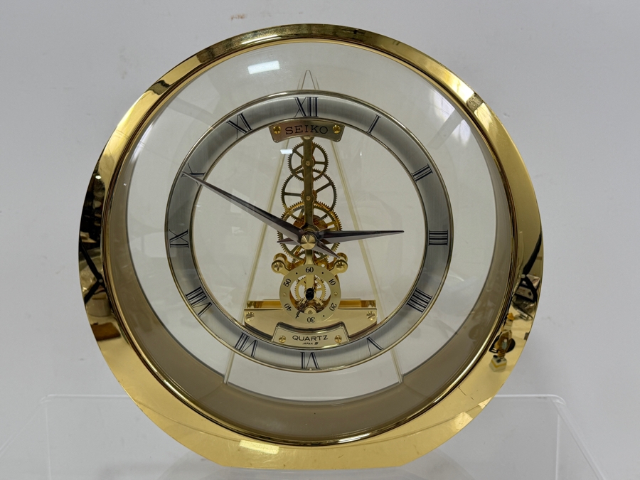 Seiko Quartz Gold Tone Round Skeleton Desk Mantel Clock With Exposed Gears And Roman Numerals Model QAW113G Made In Japan 8.5'W X 8.5'H [Photo 4]