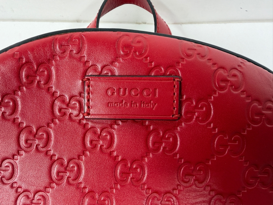 Authentic Gucci Red Signature Guccissima Leather GG Embossed Backpack Bag With Front Zip Pocket And Black Adjustable Straps Made In Italy 10.5'W x 11'H (HA) [Photo 3]