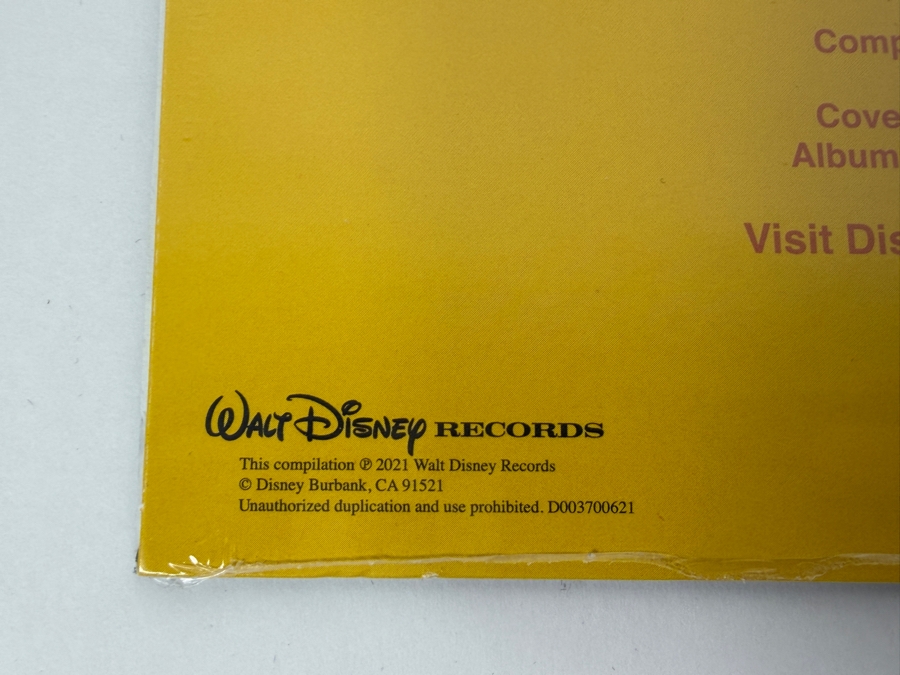 Disney D23 Gold Member 2021 Anniversary Gift 50 Years Of Walt Disney World Then And Now Vinyl Record - 7-Inch 45 RPM Transparent Red Vinyl
 [Photo 5]