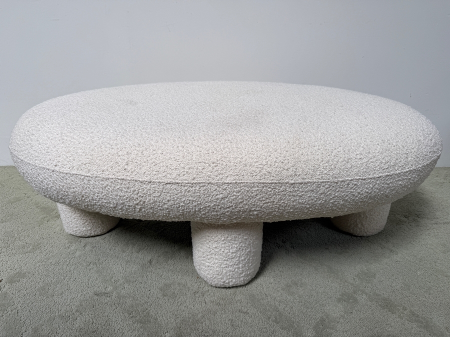 TOV Furniture Discus Oval Bouclé Upholstered Coffee Table Ottoman With Pillar Legs 45'W X 27'D X 17'H Retails $399 (HA) [Photo 3]