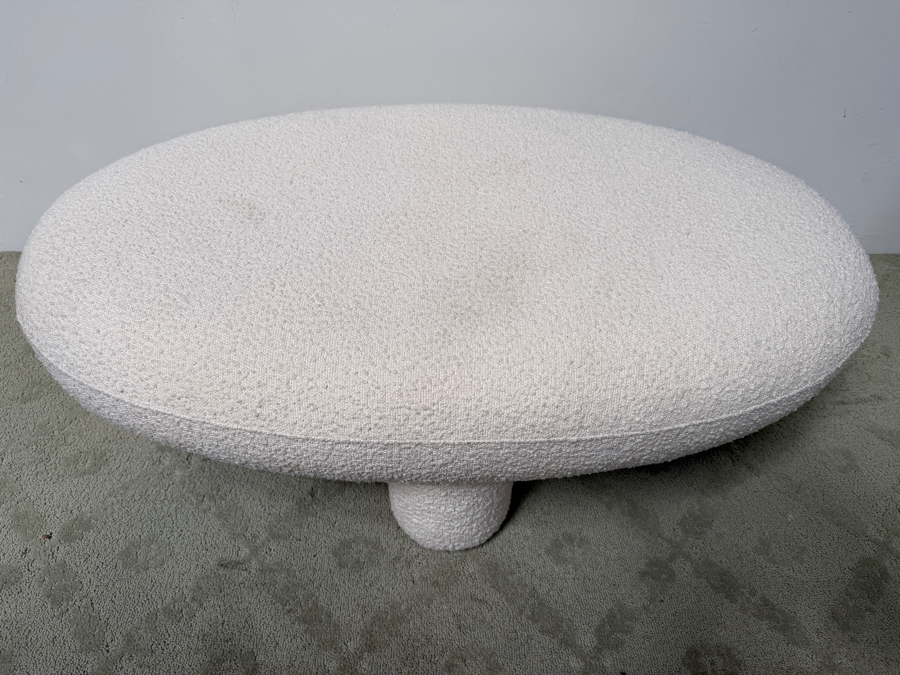 TOV Furniture Discus Oval Bouclé Upholstered Coffee Table Ottoman With Pillar Legs 45'W X 27'D X 17'H Retails $399 (HA) [Photo 4]