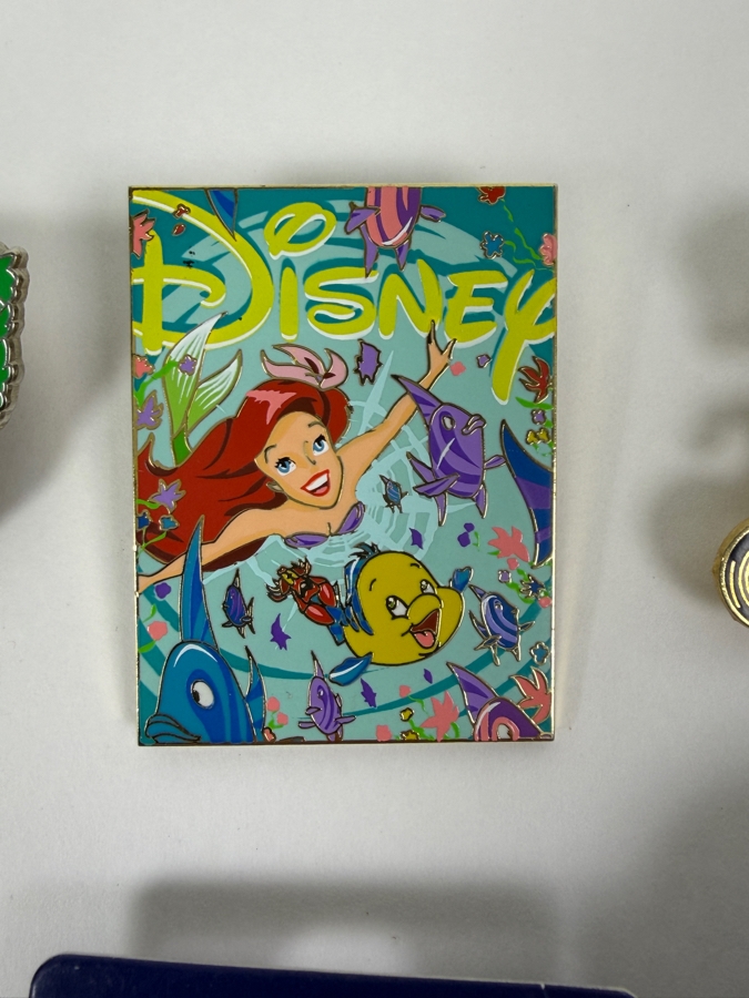Disney Parks Collector Pin Set - Disneyland Annual Passholder Donald Duck 2012, Ariel & Flounder D23 Expo 2019, Donald Duck Hidden Mickey Bicycle 2006, Donald Firefighter 2003, WDW 50th Anniversary Castle, And Disney Auctions Mickey & Minnie American Flag [Photo 6]