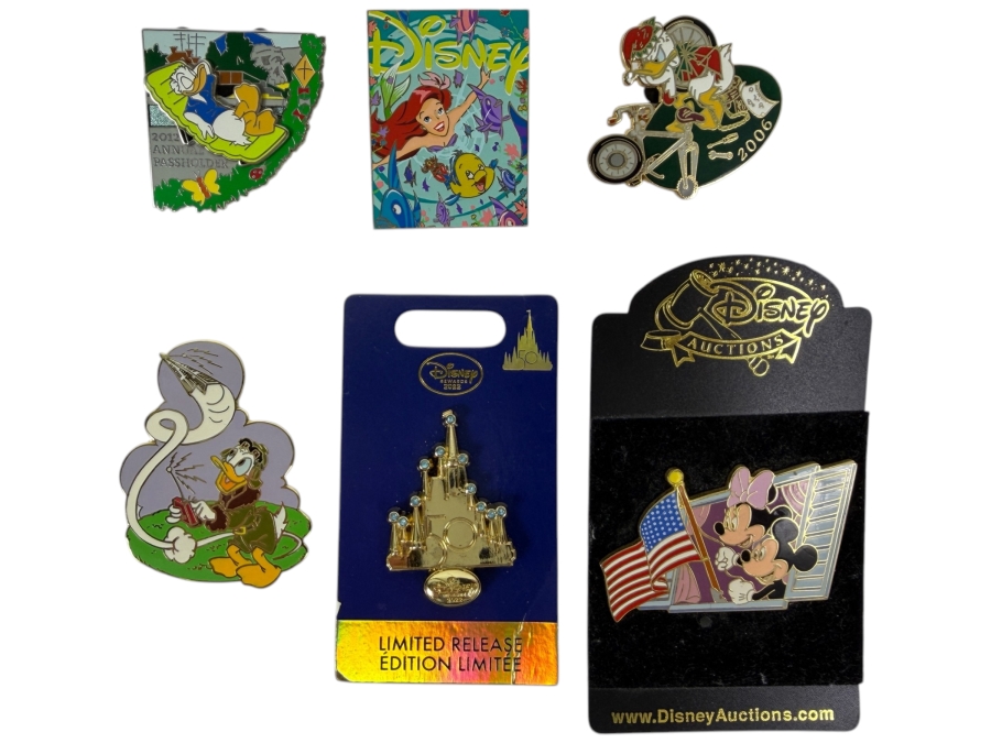 Disney Parks Collector Pin Set - Disneyland Annual Passholder Donald Duck 2012, Ariel & Flounder D23 Expo 2019, Donald Duck Hidden Mickey Bicycle 2006, Donald Firefighter 2003, WDW 50th Anniversary Castle, And Disney Auctions Mickey & Minnie American Flag