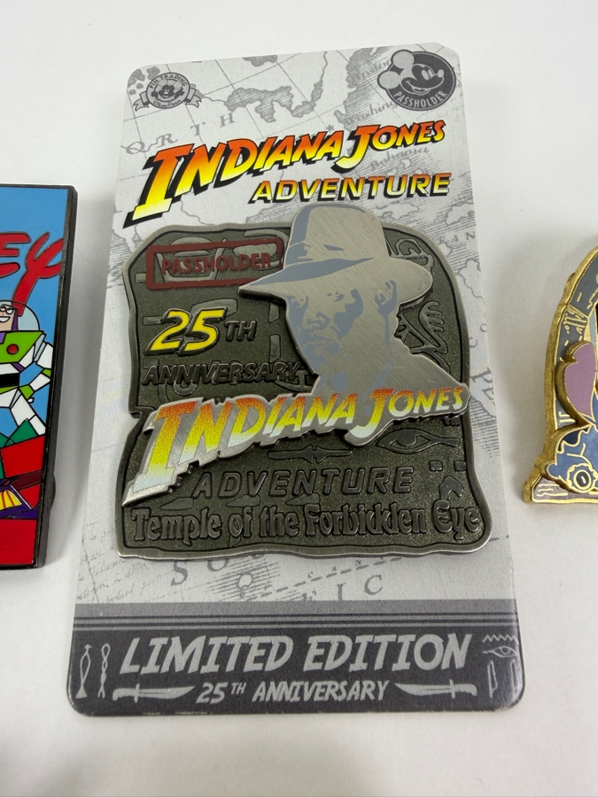 Disney Parks Limited Edition Pin Set - Toy Story Christmas 2002, Indiana Jones 25th Anniversary, Pirates Stitch Jail, Small World Ariel 2021, Belle Little Friends & Mr. Toad Writing In Ledger [Photo 2]