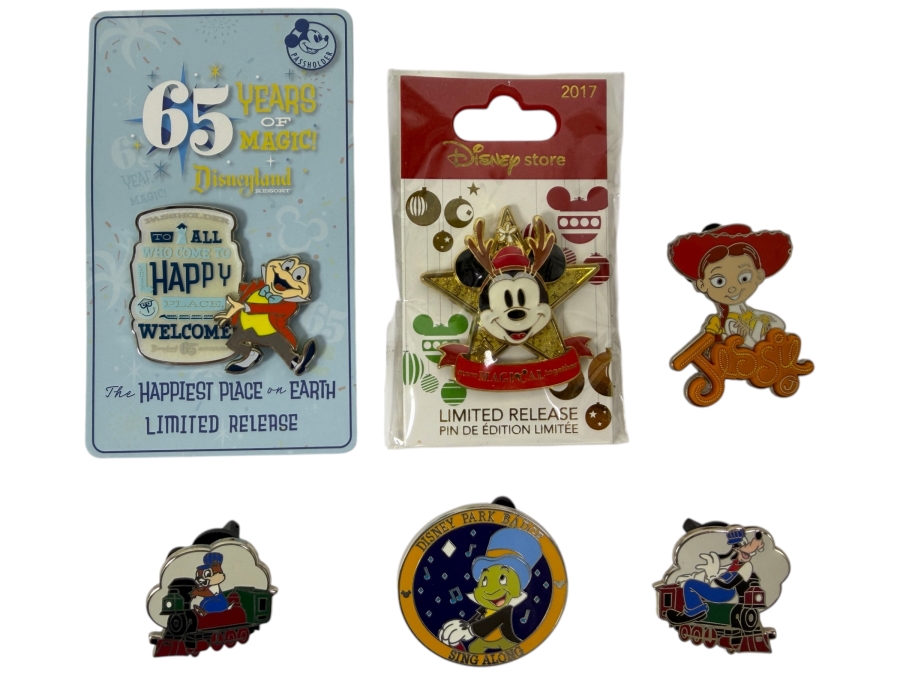 Assorted Collection Of Six Authentic Disney Pins Including Disneyland 65th Anniversary Mr. Toad, 2017 Christmas Mickey Mouse, Toy Story Jessie, And Character Train Conductors