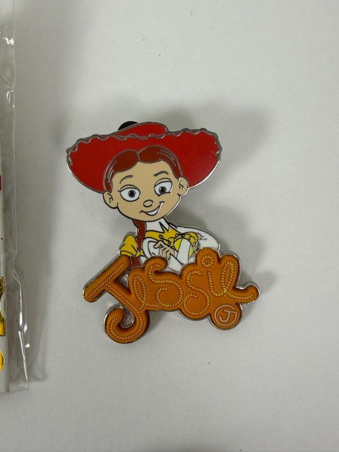 Assorted Collection Of Six Authentic Disney Pins Including Disneyland 65th Anniversary Mr. Toad, 2017 Christmas Mickey Mouse, Toy Story Jessie, And Character Train Conductors [Photo 4]