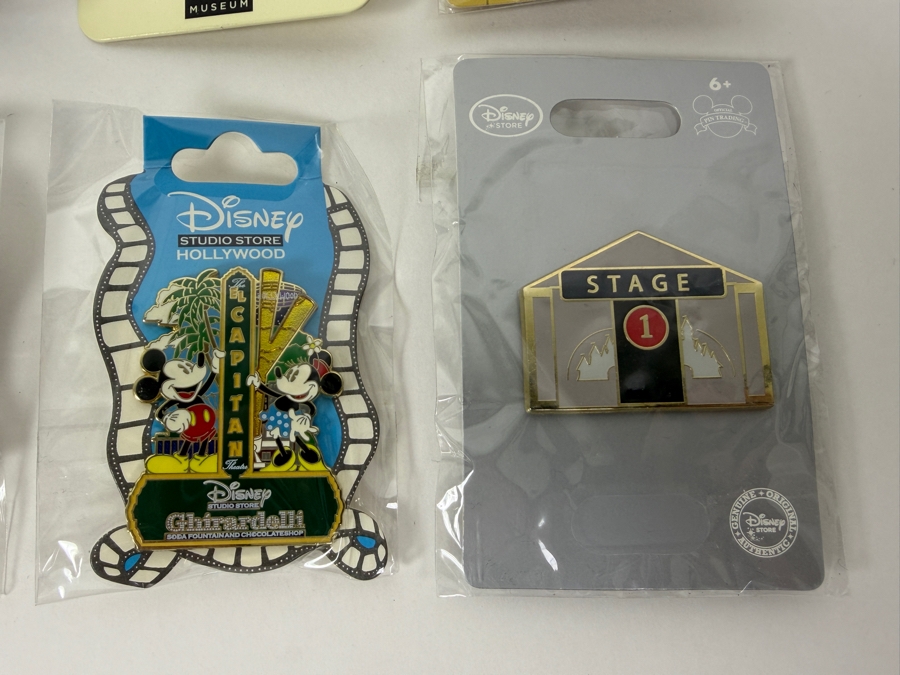 Assorted Collection Of Eight Authentic Disney Pins Including Tokyo DisneySea Logo, Disney Animation Building, And Disney Studio Store Hollywood Film Strip Series [Photo 3]