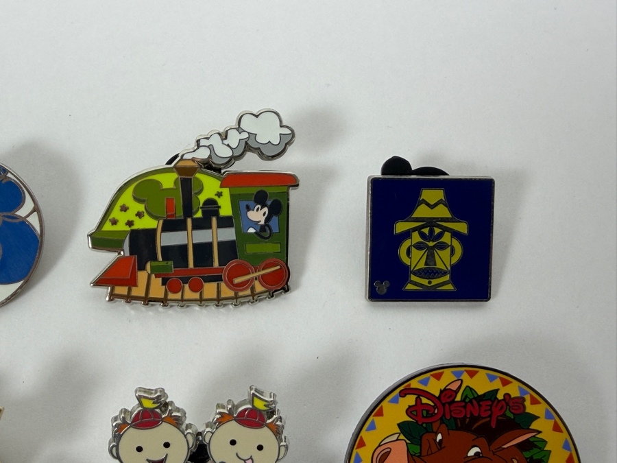 Collection Of (24) Authentic Disney Pins Featuring Characters Like Mickey Mouse As Mr. Incredible, Violet Parr, Timon and Pumbaa Wild About Safety Logo, And The Epcot World Showcase United Kingdom Flag Icon [Photo 11]