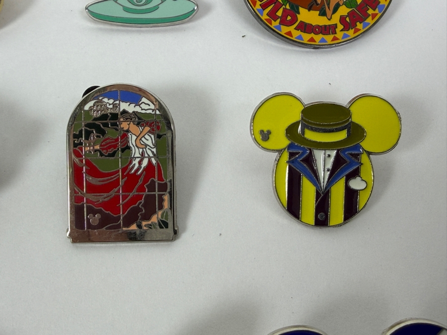 Collection Of (24) Authentic Disney Pins Featuring Characters Like Mickey Mouse As Mr. Incredible, Violet Parr, Timon and Pumbaa Wild About Safety Logo, And The Epcot World Showcase United Kingdom Flag Icon [Photo 5]