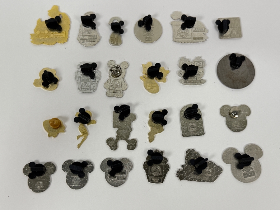 Collection Of (24) Authentic Disney Pins Featuring Characters Like Mickey Mouse As Mr. Incredible, Violet Parr, Timon and Pumbaa Wild About Safety Logo, And The Epcot World Showcase United Kingdom Flag Icon [Photo 14]