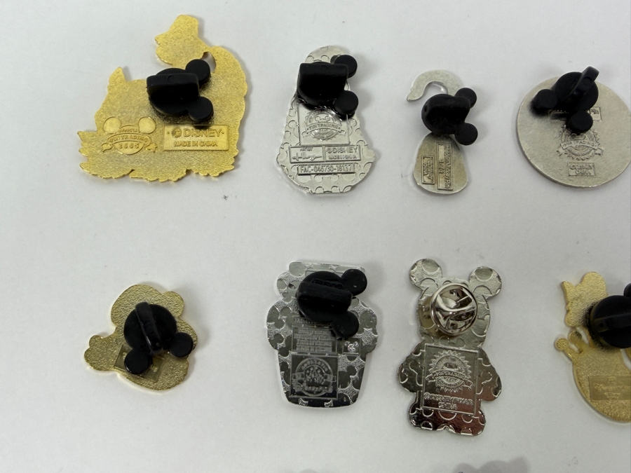 Collection Of (24) Authentic Disney Pins Featuring Characters Like Mickey Mouse As Mr. Incredible, Violet Parr, Timon and Pumbaa Wild About Safety Logo, And The Epcot World Showcase United Kingdom Flag Icon [Photo 18]