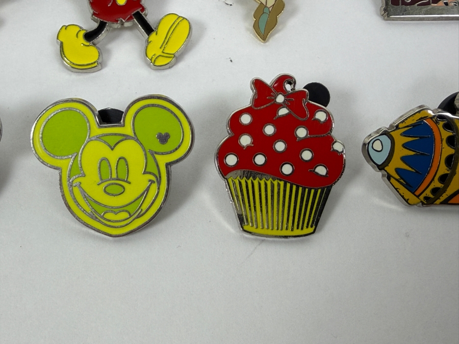 Collection Of (24) Authentic Disney Pins Featuring Characters Like Mickey Mouse As Mr. Incredible, Violet Parr, Timon and Pumbaa Wild About Safety Logo, And The Epcot World Showcase United Kingdom Flag Icon [Photo 3]