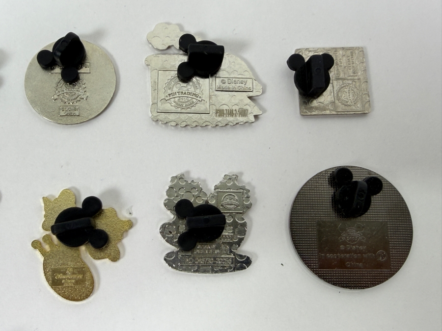Collection Of (24) Authentic Disney Pins Featuring Characters Like Mickey Mouse As Mr. Incredible, Violet Parr, Timon and Pumbaa Wild About Safety Logo, And The Epcot World Showcase United Kingdom Flag Icon [Photo 17]