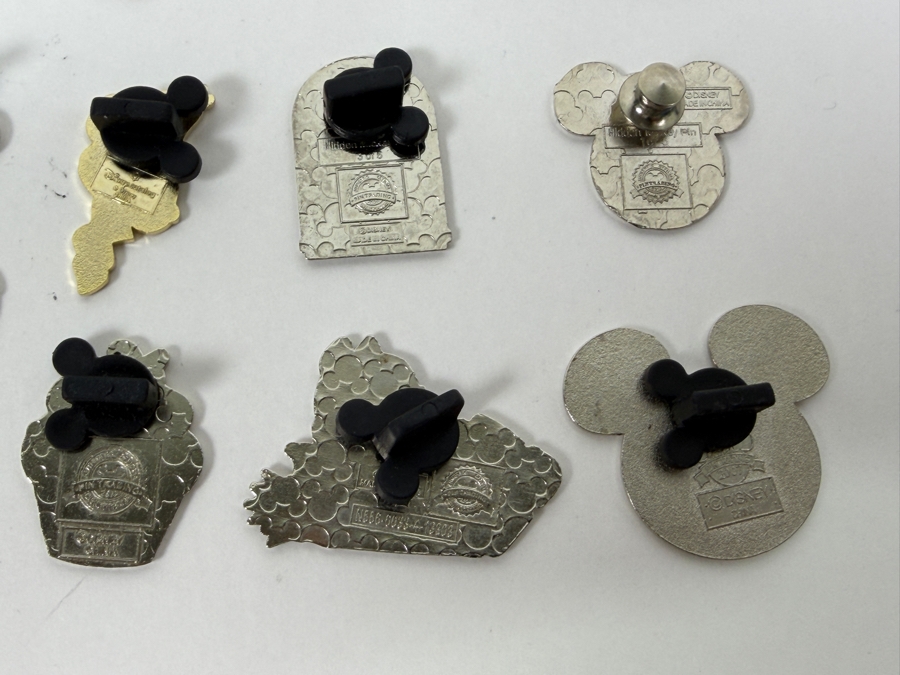 Collection Of (24) Authentic Disney Pins Featuring Characters Like Mickey Mouse As Mr. Incredible, Violet Parr, Timon and Pumbaa Wild About Safety Logo, And The Epcot World Showcase United Kingdom Flag Icon [Photo 16]