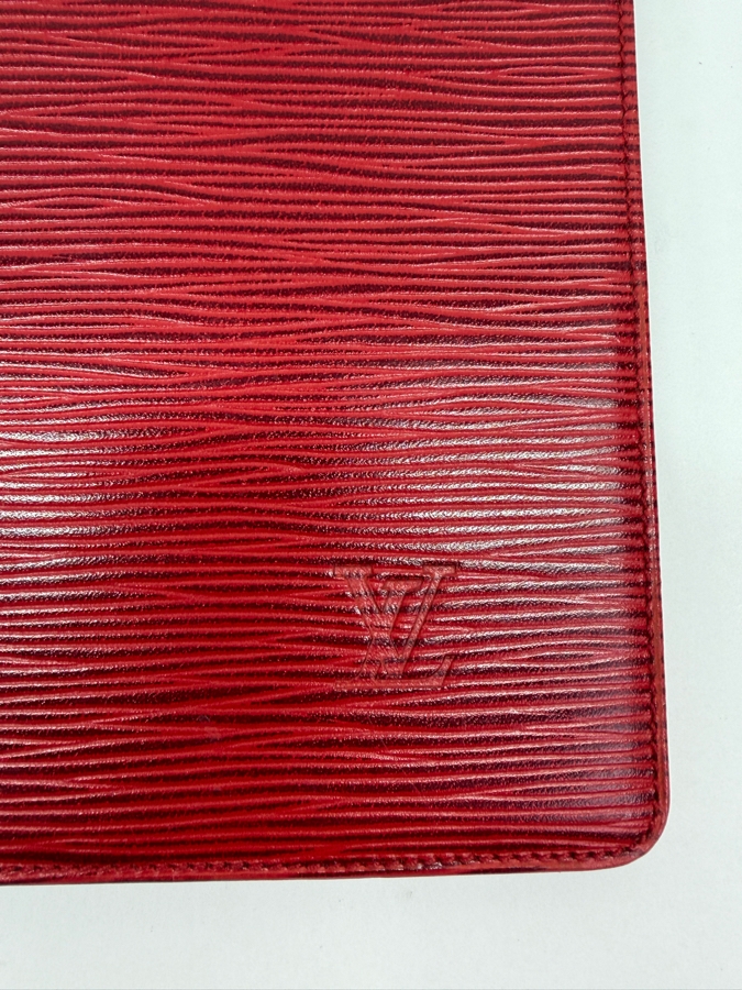 Just Added - Louis Vuitton Castilian Red Epi Leather Desk Agenda Cover Featuring Bi-Fold Design And Debossed LV Logo Motif 5.25'W X 9.75'H [Photo 3]