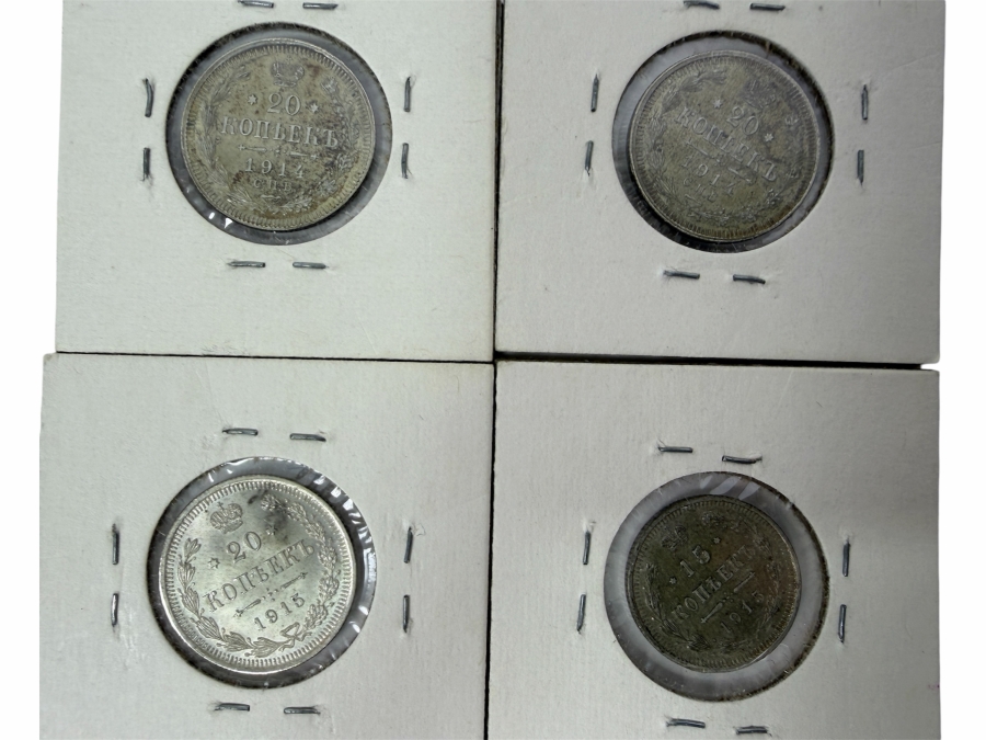 (2) 1914 Russian Empire 20 Kopeks Silver Coins (1) 1915 Russian Empire 20 Kopeks Silver Coins And (1) 1915 Russian Empire 15 Kopeks Silver Coin
