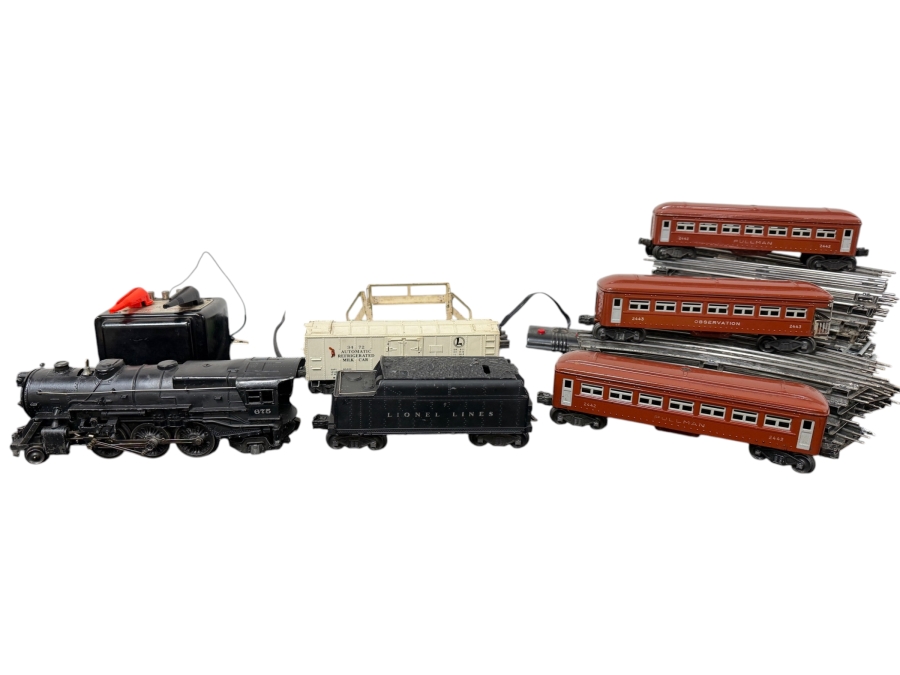 Vintage 1940s Lionel Postwar O-Gauge Train Set Featuring A Lionel 675 Steam Locomotive, Whistle Tender, Passenger Cars, Automatic Refrigerated Milk Car, Tracks, Lionel Type 1033 Multi-Control Transformer And More