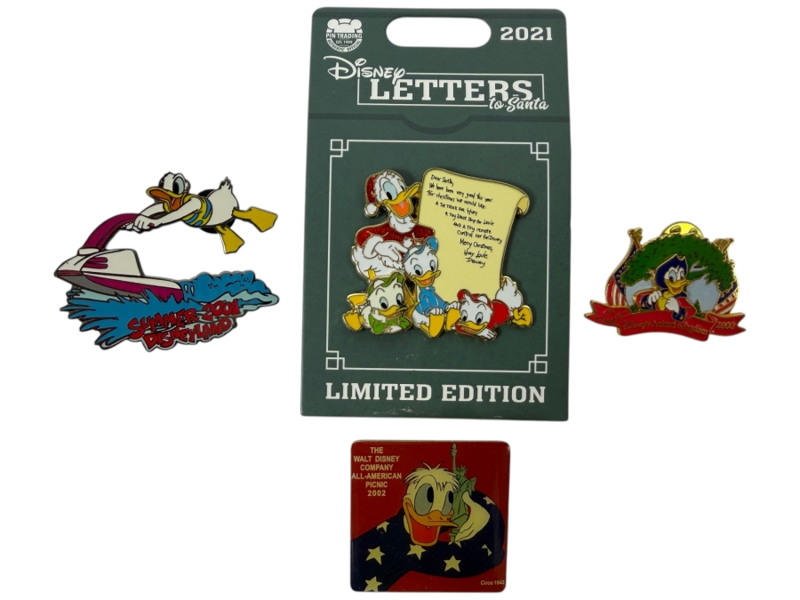 Just Added - Disney Limited Edition Pins: 2021 Letters To Santa Donald & Nephews LE 4000, 2001 Disneyland Summer Jet Ski Donald LE 3600, 2000 Animal Kingdom 4th Of July Donald, And 2002 All-American Picnic Donald LE 2500 Collection
