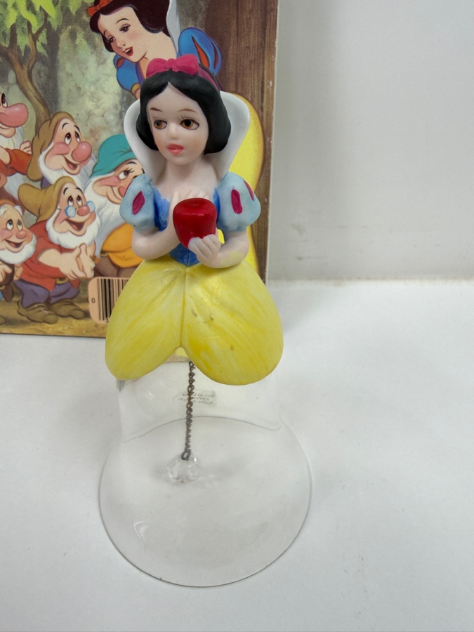 Just Added - Walt Disney's Snow White And The Seven Dwarfs Collector Set Featuring Kenleys Cartoon Classics Plate, 1948 Little Golden Book, Large Ceramic Poison Apple, And Hand Painted Glass Figurine Bell Collection [Photo 4]
