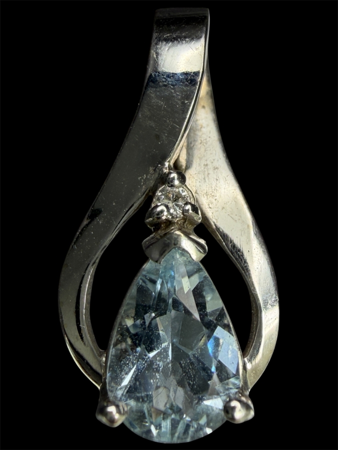 14k Gold 9x6mm Pear Shape Sky Blue Topaz Pendant With .01 Diamond 2.3g Retails $900