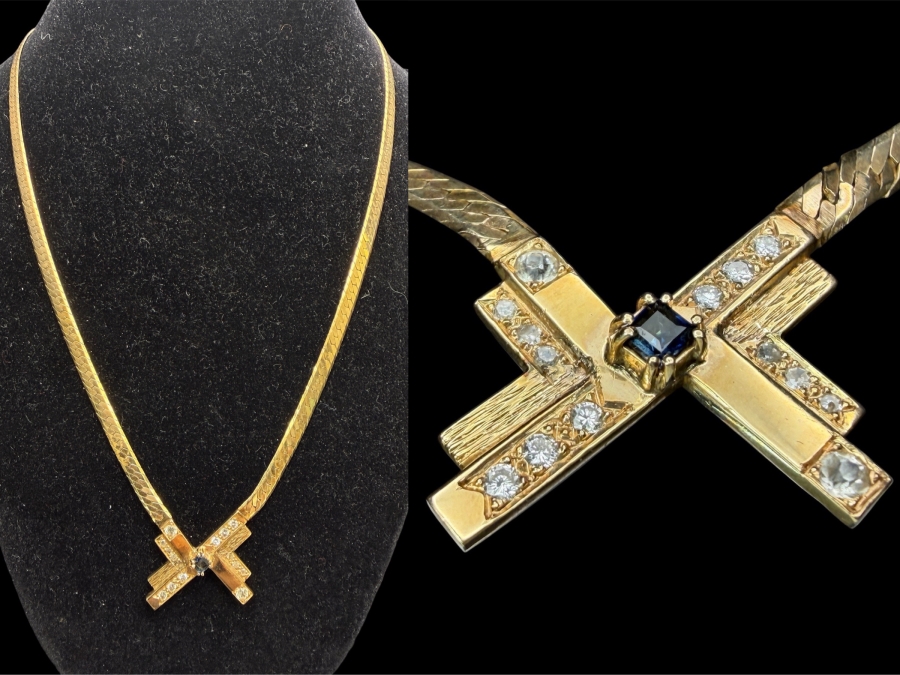 14k Gold 18' Italian Chain Necklace With 14k Gold Pendant Featuring A 3mm Brilliant Sapphire, (2) 2.5mm White Sapphires, (6) 1.4mm Round Brilliant (RB) Diamonds And (6) 1.2mm RB Diamonds 17.0g Retails $6,000