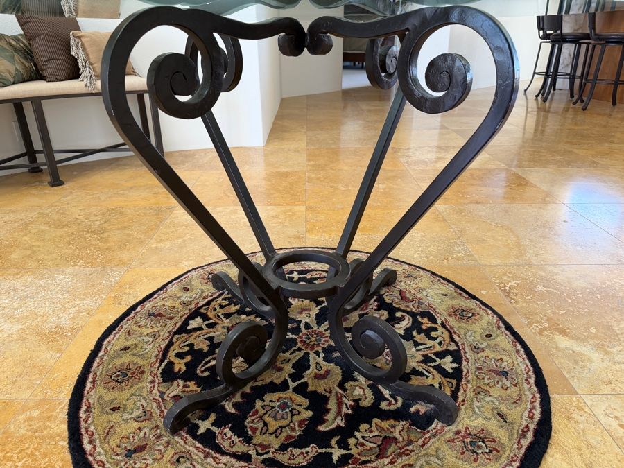 Round Glass Top Entry Table With Wrought Iron Scrollwork Pedestal Base (46'W X 31'H) On A Traditional Floral Medallion Circular Area Rug (43'W) [Photo 6]