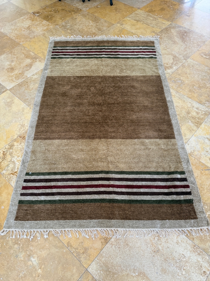 Hand-Knotted Earth-Tone Striped Wool Area Rug With Fringed Edges
58'W X 98'L [Photo 2]