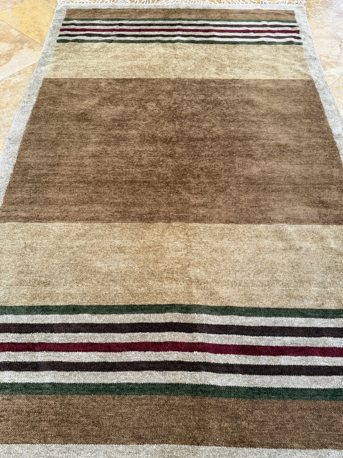 Hand-Knotted Earth-Tone Striped Wool Area Rug With Fringed Edges
58'W X 98'L [Photo 4]