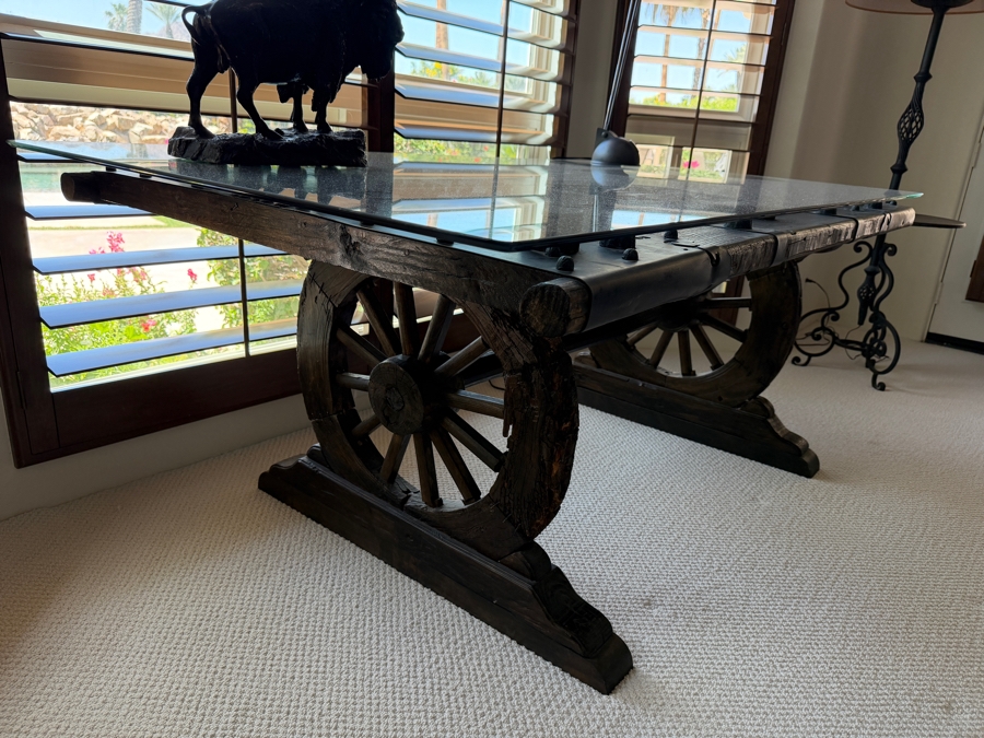 Custom Rustic Wagon Wheel Trestle Desk Featuring A Repurposed Antique Indian Door Top With Hand-Forged Iron Studs Strapping And Glass Top 72'W X 39'D X30'H [Photo 7]