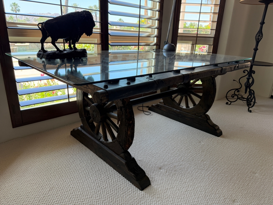 Custom Rustic Wagon Wheel Trestle Desk Featuring A Repurposed Antique Indian Door Top With Hand-Forged Iron Studs Strapping And Glass Top 72'W X 39'D X30'H [Photo 5]