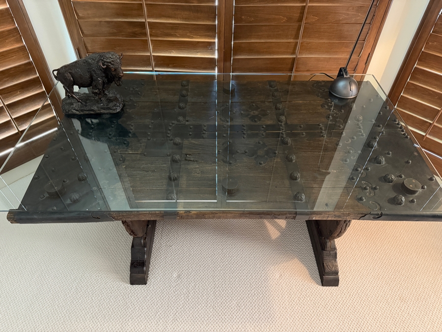 Custom Rustic Wagon Wheel Trestle Desk Featuring A Repurposed Antique Indian Door Top With Hand-Forged Iron Studs Strapping And Glass Top 72'W X 39'D X30'H [Photo 8]