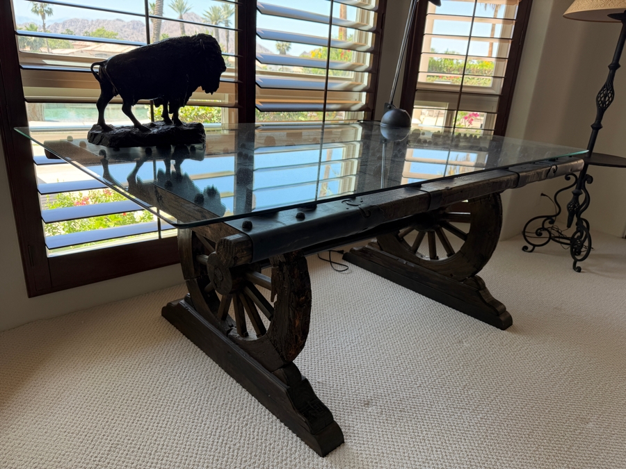 Custom Rustic Wagon Wheel Trestle Desk Featuring A Repurposed Antique Indian Door Top With Hand-Forged Iron Studs Strapping And Glass Top 72'W X 39'D X30'H [Photo 6]