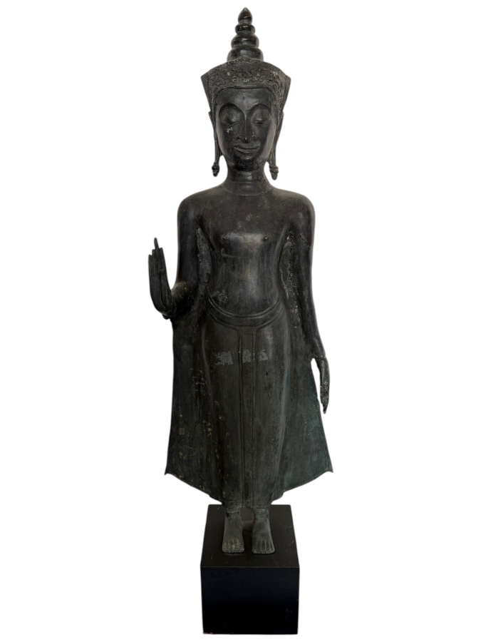 LARGE Thai Bronze Standing Buddha Sculpture Featuring The Abhaya Mudra Gesture Tiered Flame Headdress And Weathered Patina On A Black Gallery Pedestal 41'H

