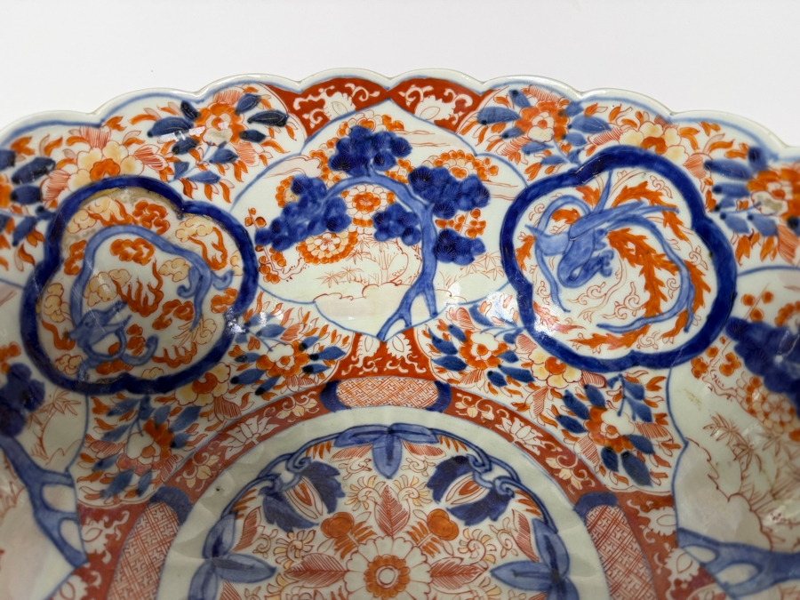 Just Added - Antique Japanese Imari Porcelain Scalloped Bowl Featuring Traditional Underglaze Blue And Overglaze Iron Red Floral And Pine Tree Motifs 13.5'W X 6.75'H [Photo 7]